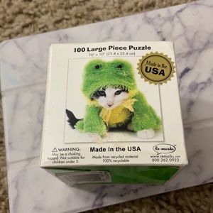 Kitten in frog costume puzzle